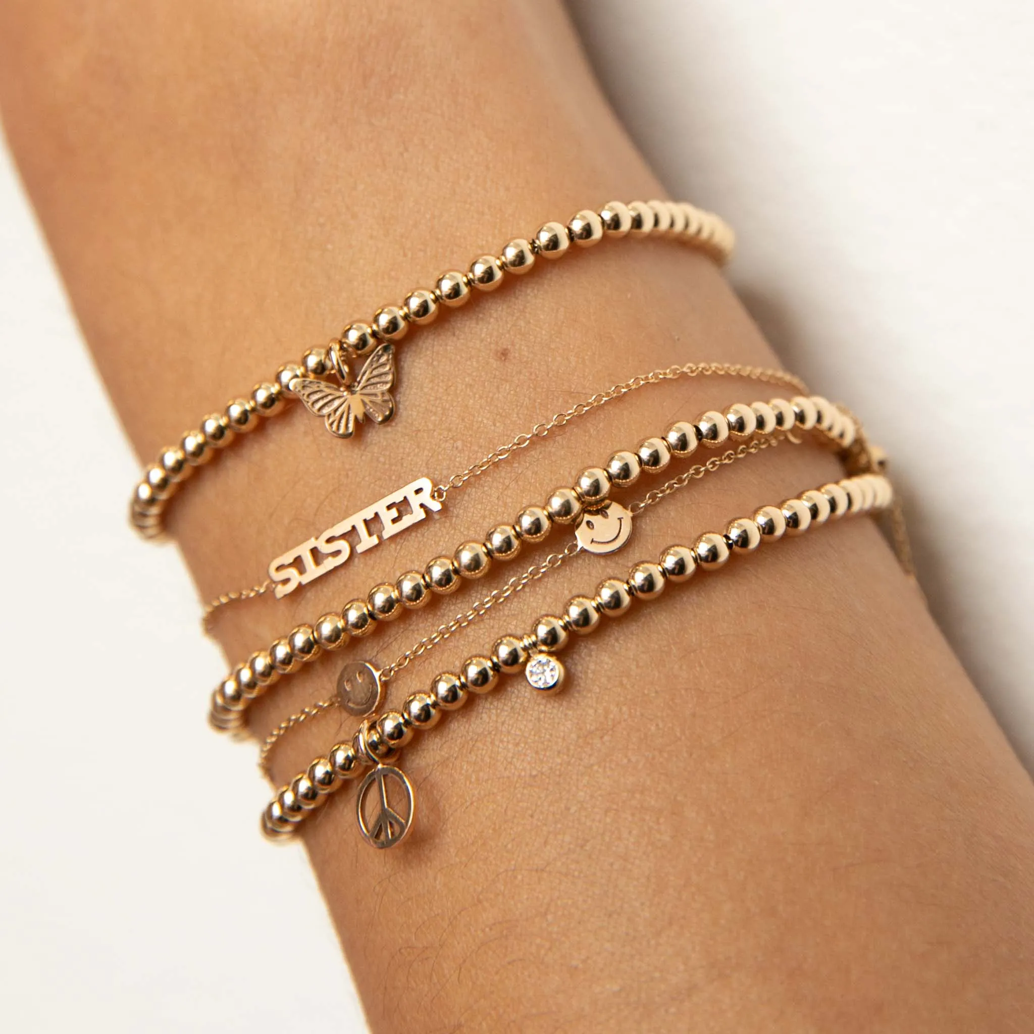 14k Itty Bitty SISTER Bracelet