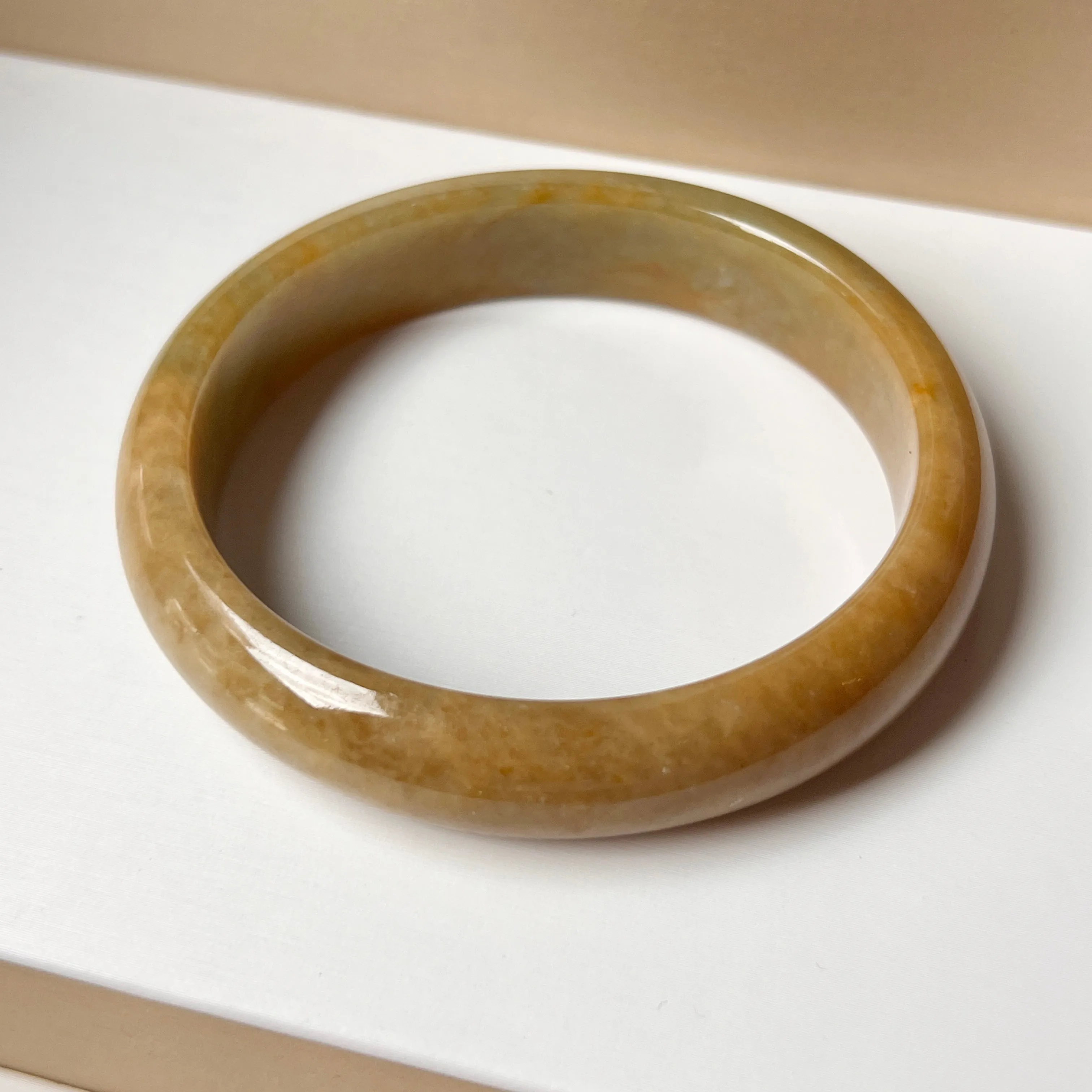 54.8mm A-Grade Natural Russet Jadeite Modern Oval Bangle No. 152008
