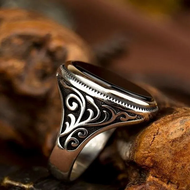 Craved Pattern Black Egg-shaped Crystal Ring