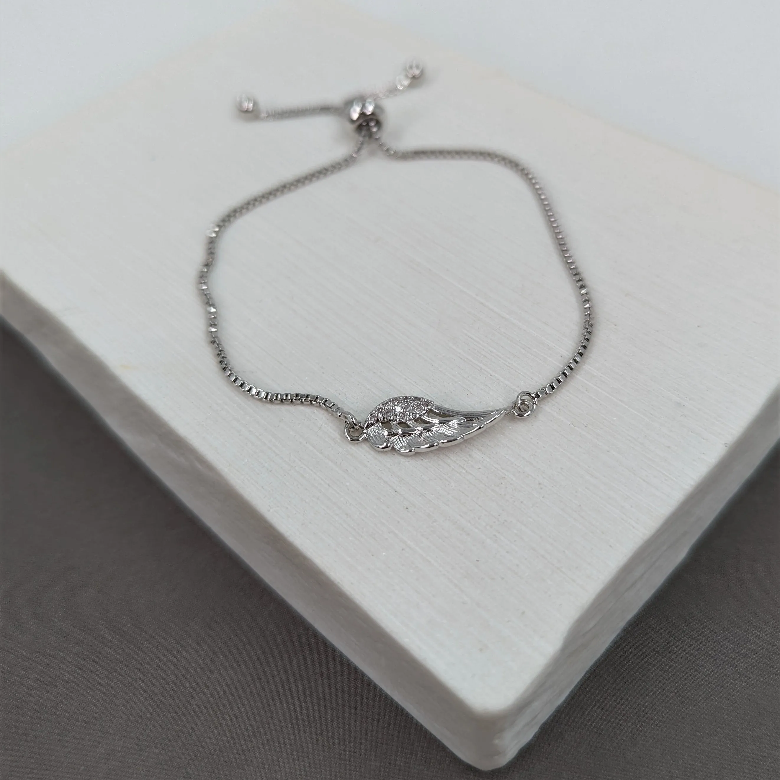 Delicate small crystal angel wing bracelet