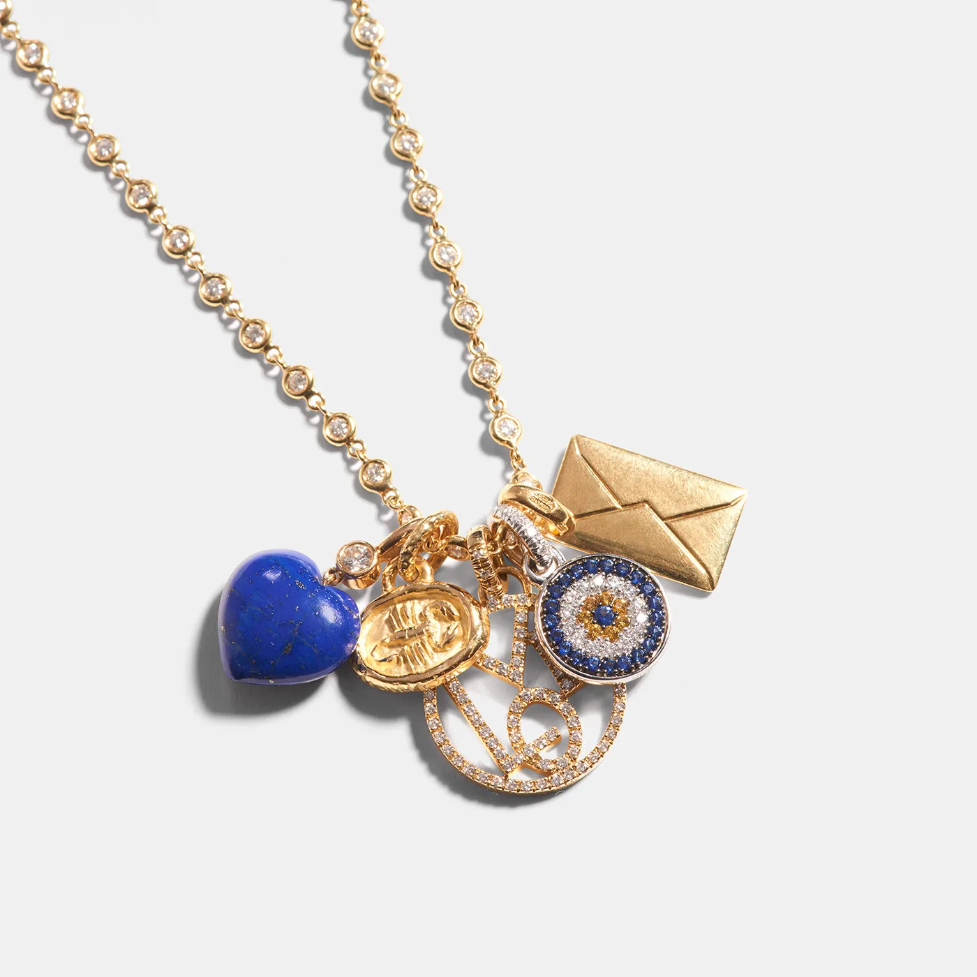 Evil Eye Charm with Diamonds & Sapphires