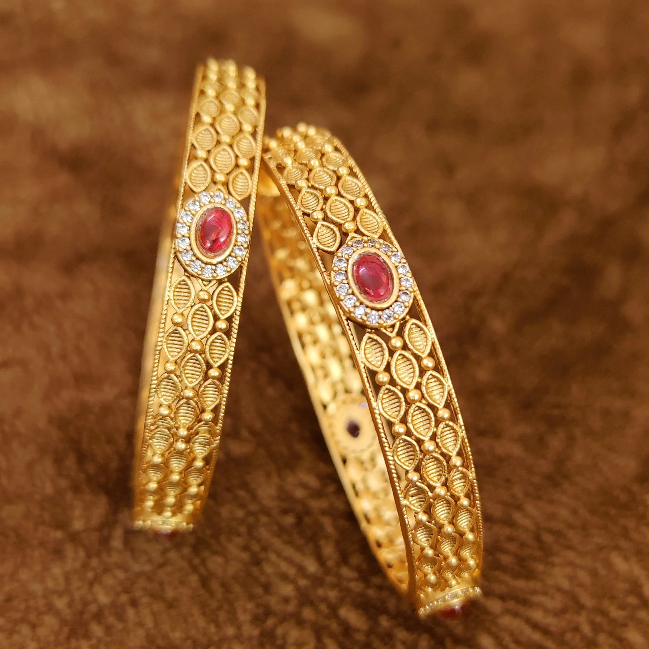 GOLD PLATED RUBY & AD BANGLES