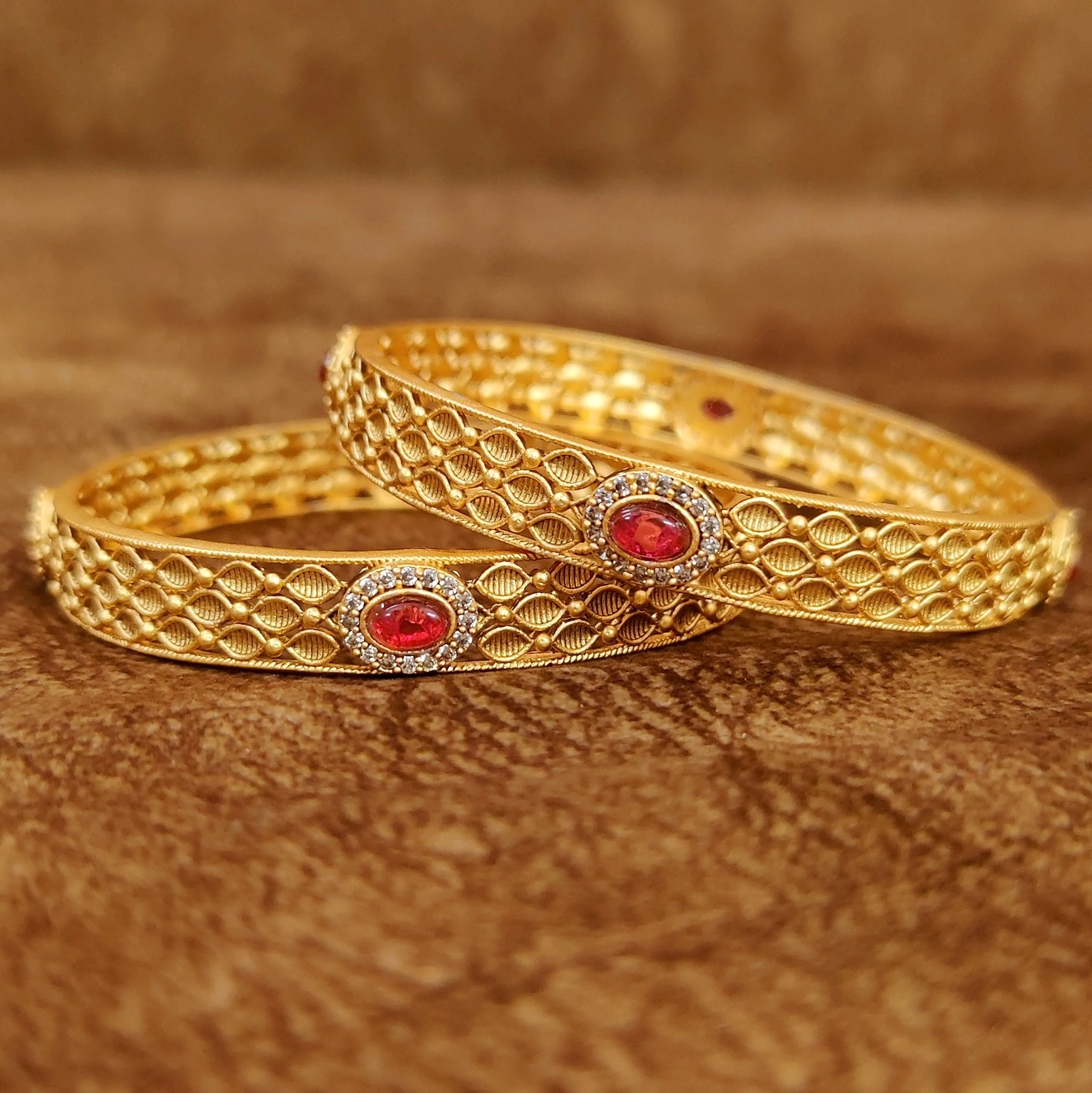 GOLD PLATED RUBY & AD BANGLES