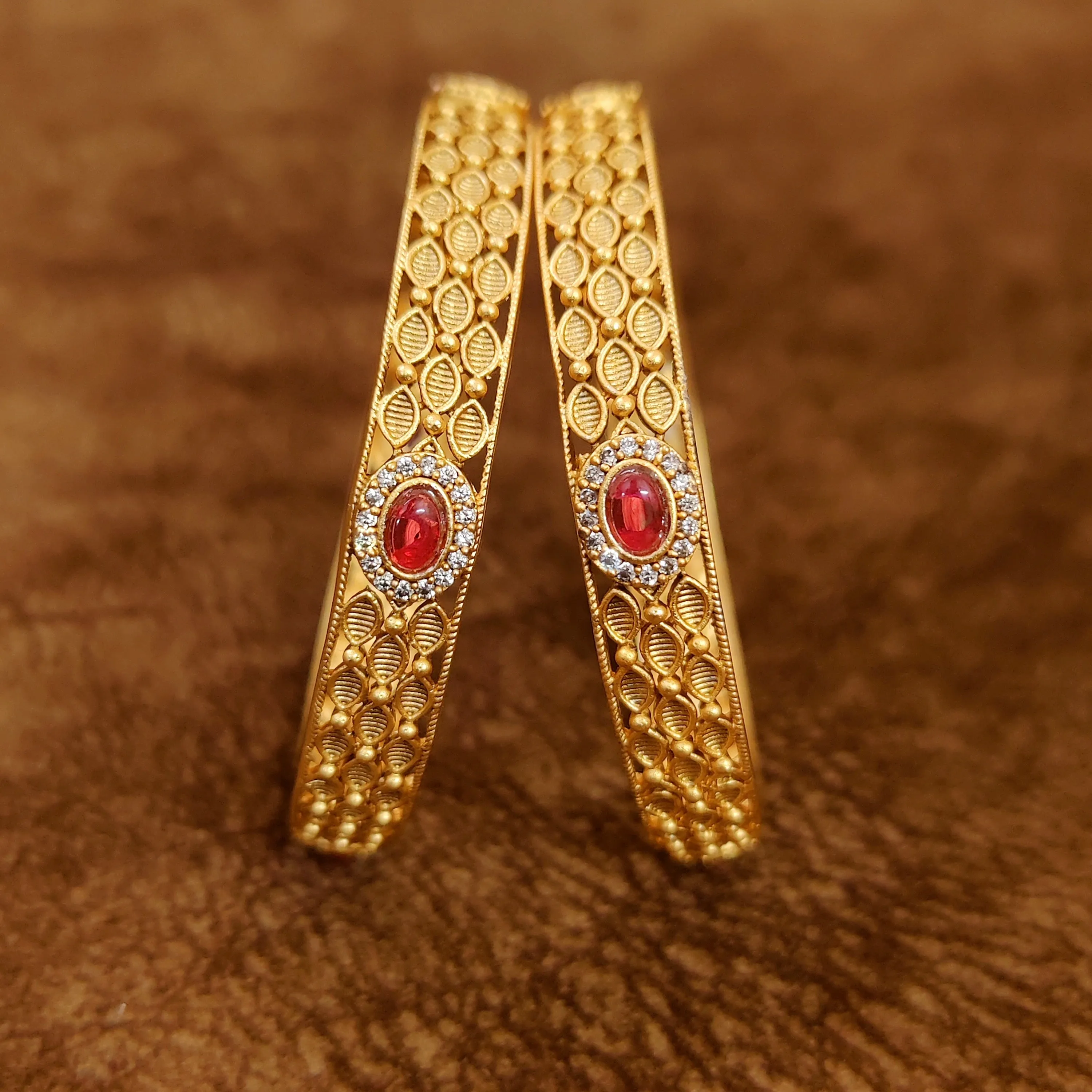 GOLD PLATED RUBY & AD BANGLES