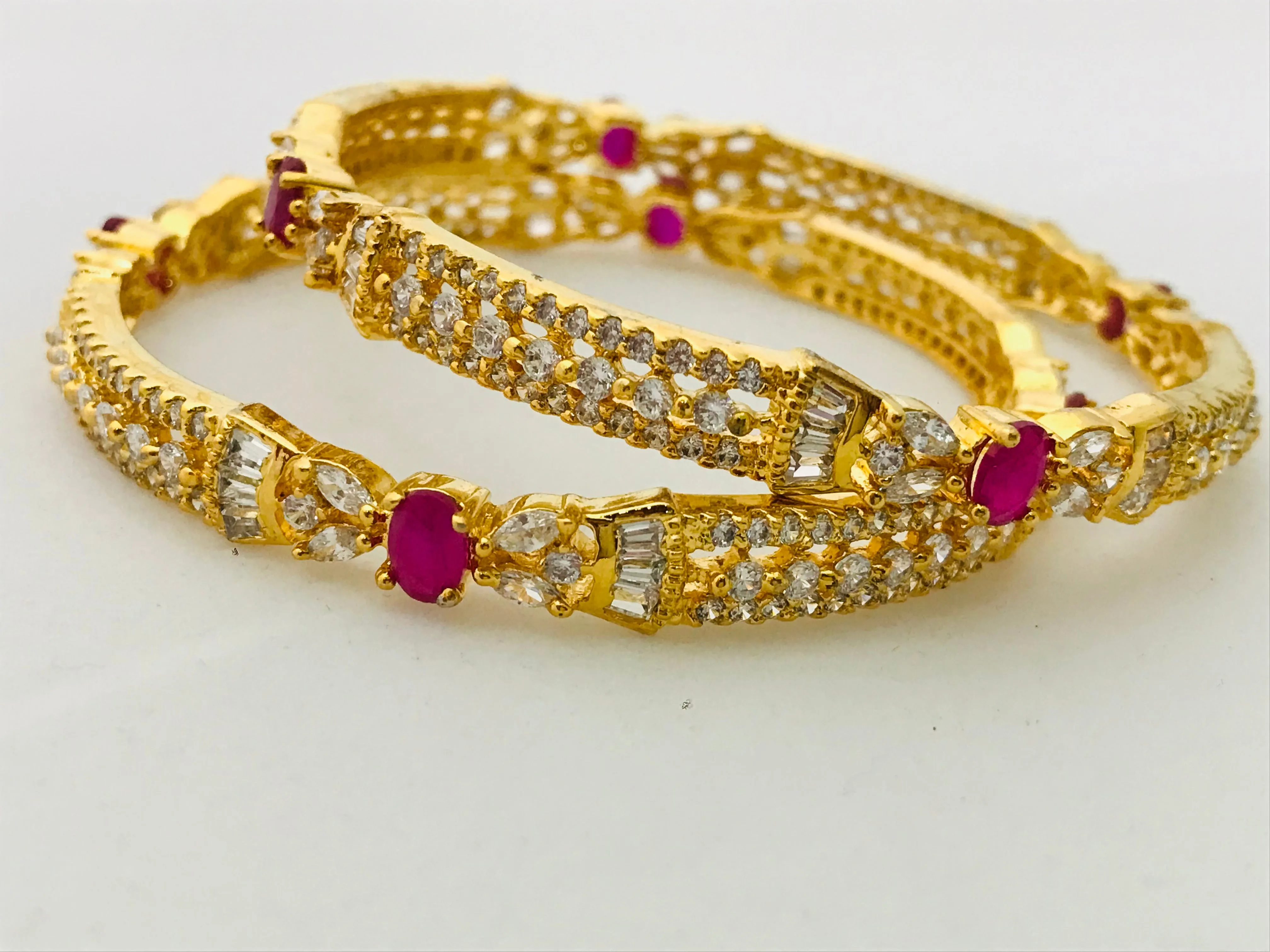Modern Gold Plated Antique Bangles With Ruby And White Stones