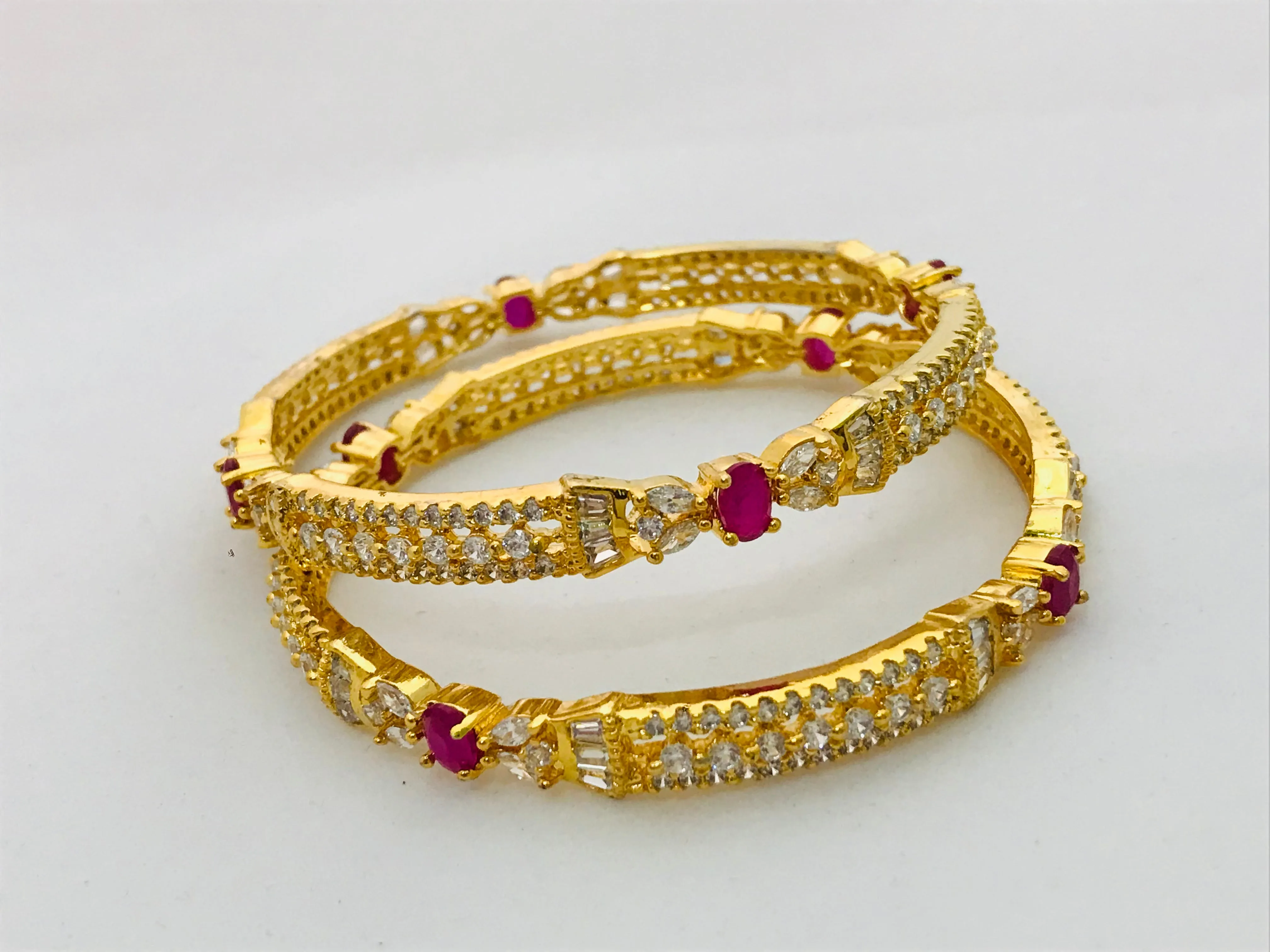 Modern Gold Plated Antique Bangles With Ruby And White Stones