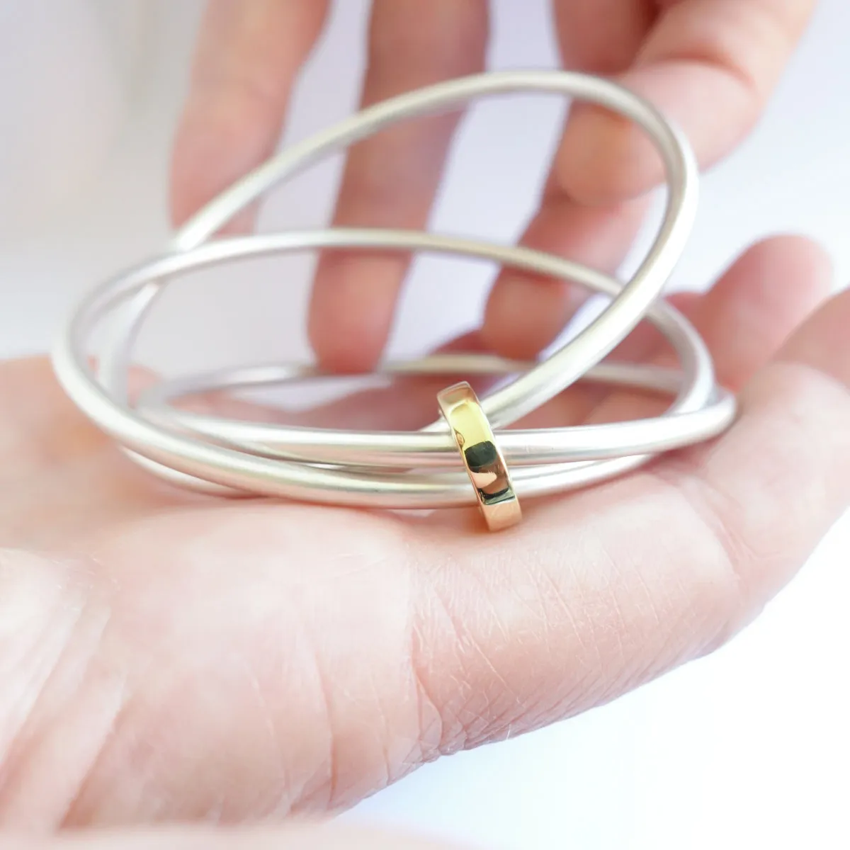 Silver and 18ct yellow gold bangle - modern and unique