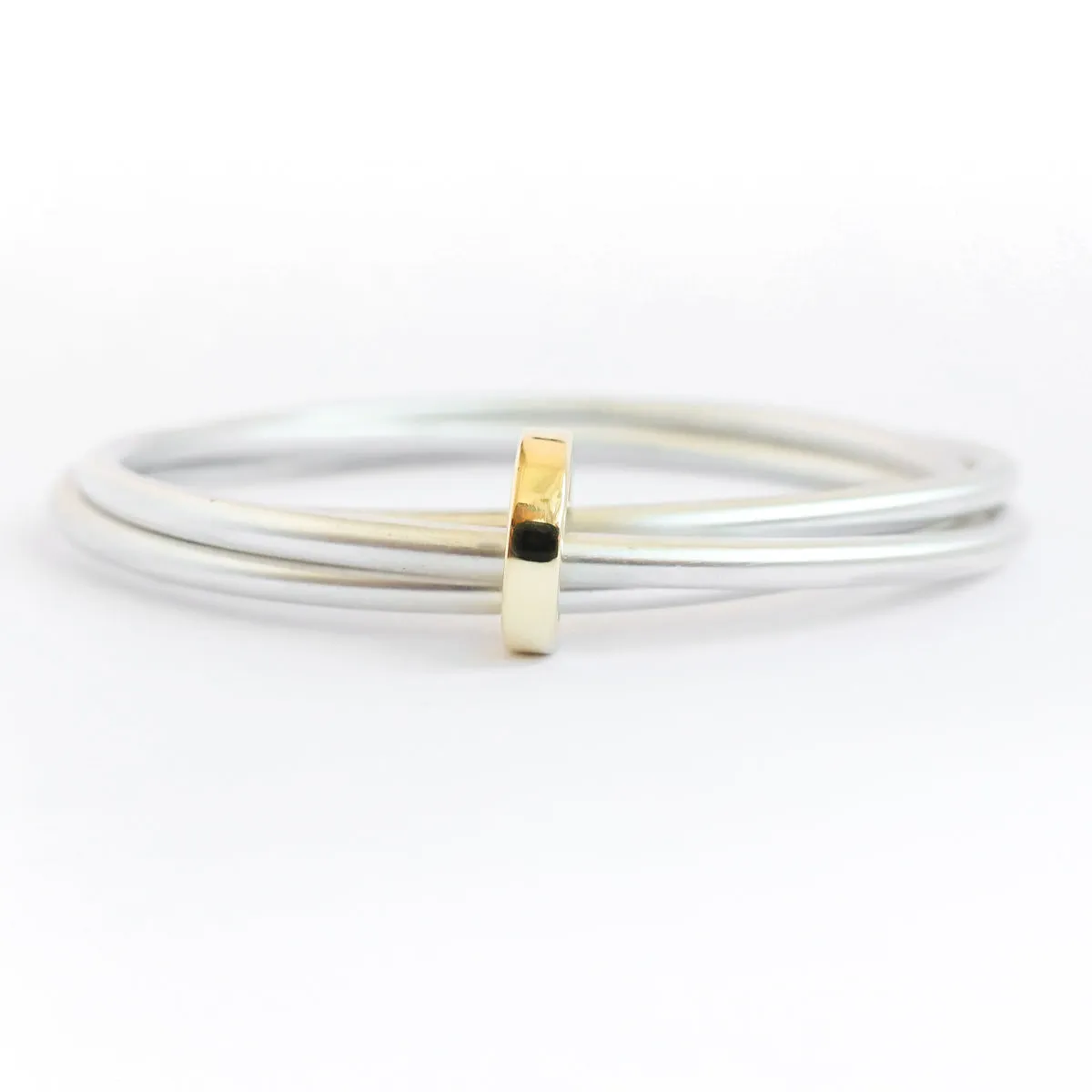 Silver and 18ct yellow gold bangle - modern and unique