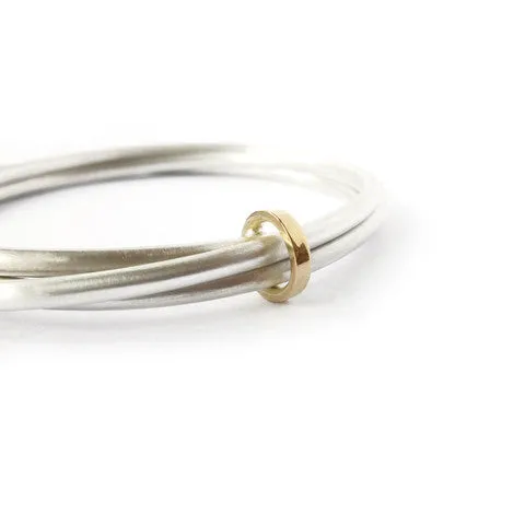 Silver and 18ct yellow gold bangle - modern and unique