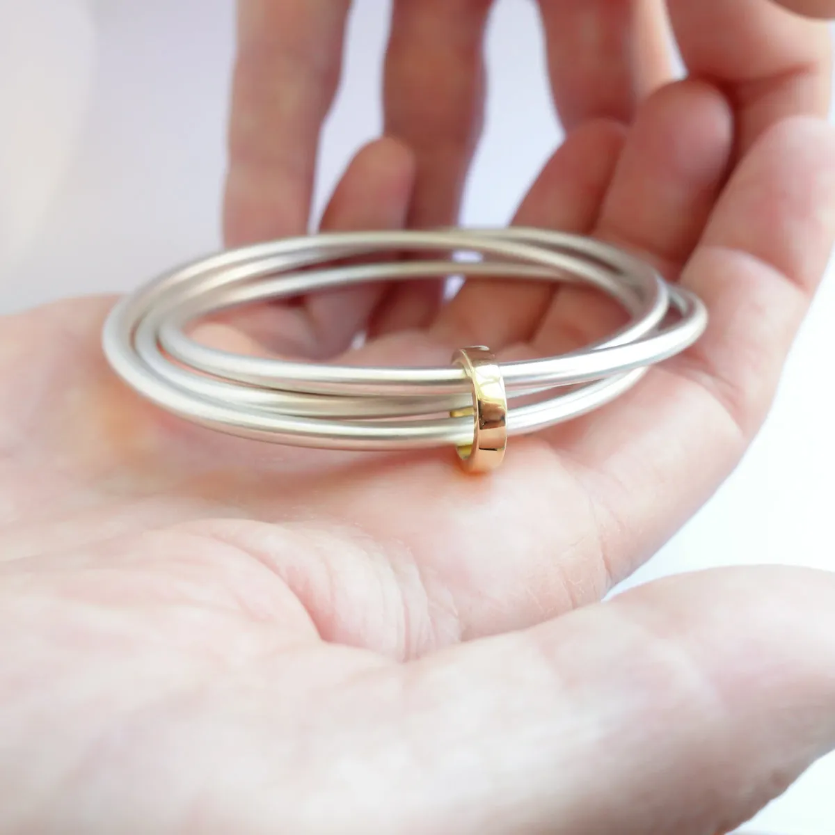 Silver and 18ct yellow gold bangle - modern and unique