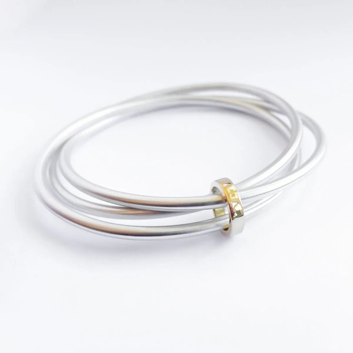 Silver and 18ct yellow gold bangle - modern and unique