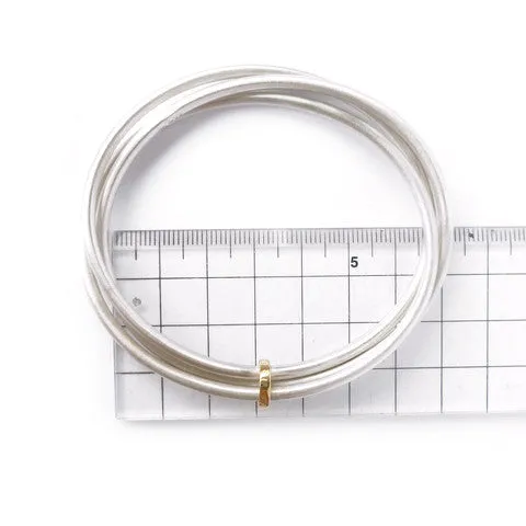 Silver and 18ct yellow gold bangle - modern and unique