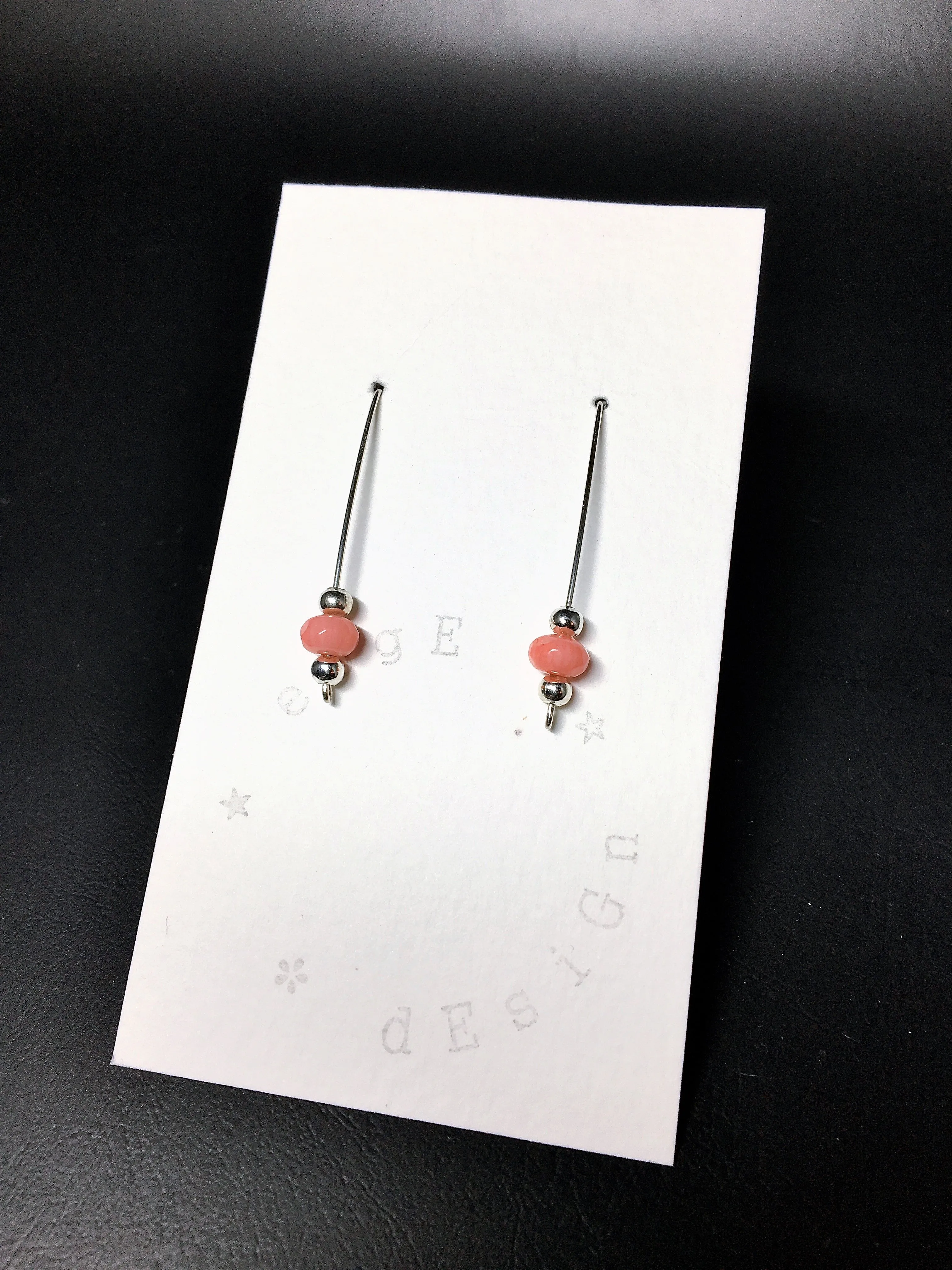 Sterling silver single wire earrings - Coral faceted beads and silver spacer beads