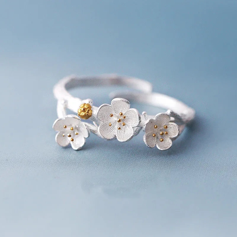 The cherry blossom branch resizable open ring in white copper silver plated
